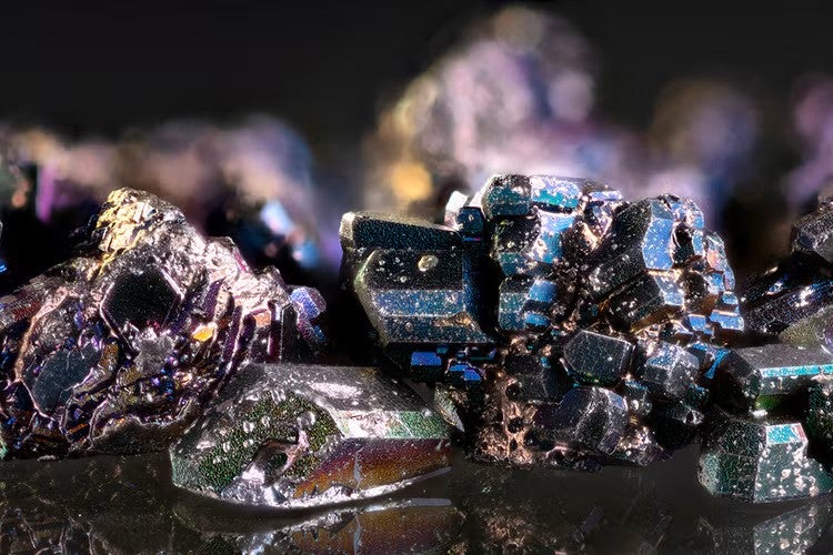 Macro photography of a metal alloy sample containing Scandium, Vanadium and Tin