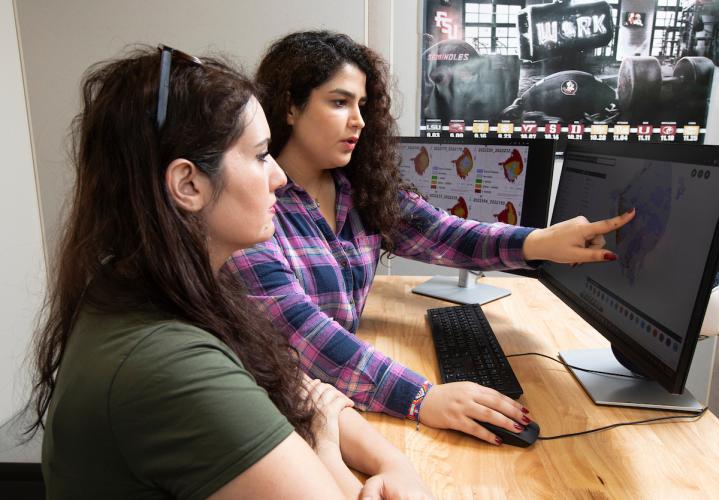 Nasrin Alamdari and student study algae blooms