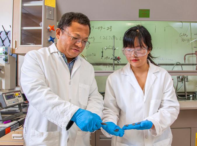 Professor Richard Liang and graduate student in lab