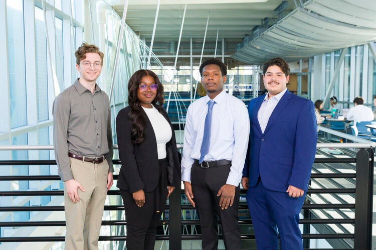 Members of Team 228 left to right: James Dockstader, Phoebe Jean-Baptiste, Carlentz Maurice, Alexander Nunez