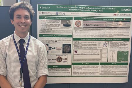 photo of aj hoolihan famu-fsu engineering student with his ornl poster