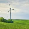 photo of wind turbine in a field