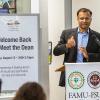 suvranu de speaks at podium