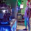 photo of lance cooley and andre juliao with the dark matter particle detector in the lab