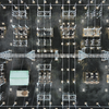 aerial view of electrical substation with wires and towers from top view