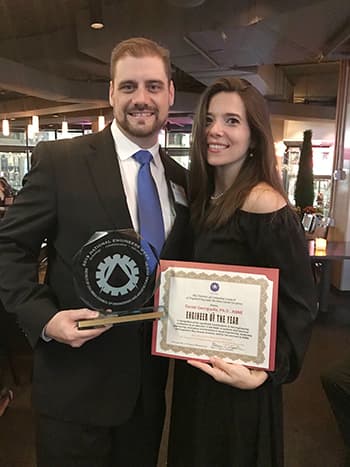 Danny Georgiadis and wife with award