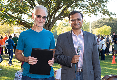 allen saad, alumnus and suvranu de, dean at the green and gold event