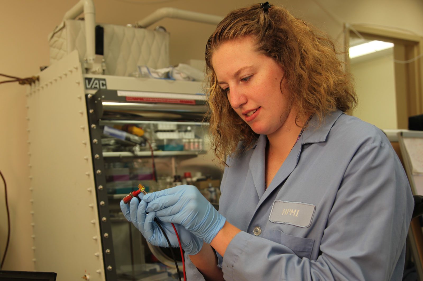 Female researcher conducting an experiment