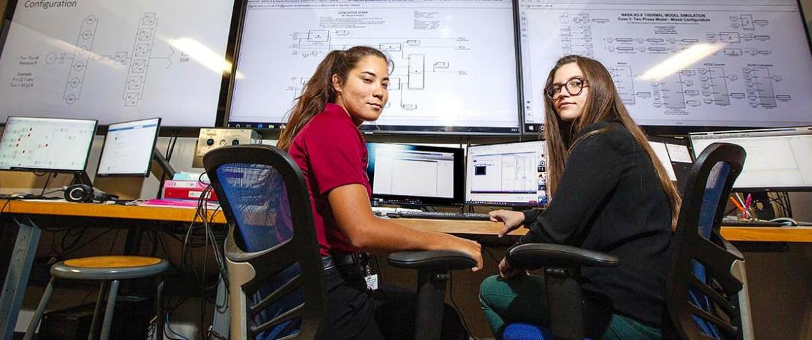 Undergraduates Delaney Freeman, left, and Isabel Barnola are undergraduate first authors on research conducted at the Center for Advanced Power Systems (CAPS), a research facility associated with the FAMU-FSU College of Engineering in Tallahassee, FL.  
