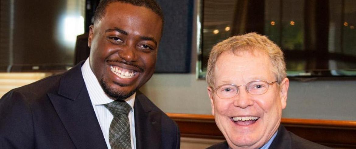 Eric Hellstrom, Ph.D. (right) gives Gregory Boler, Jr. (left) at the 2019 ME Distinguished Alumni Awards Banquet.