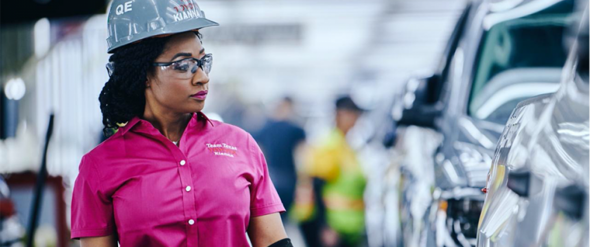 Kianna Porter inspecting cars on Toyota production line