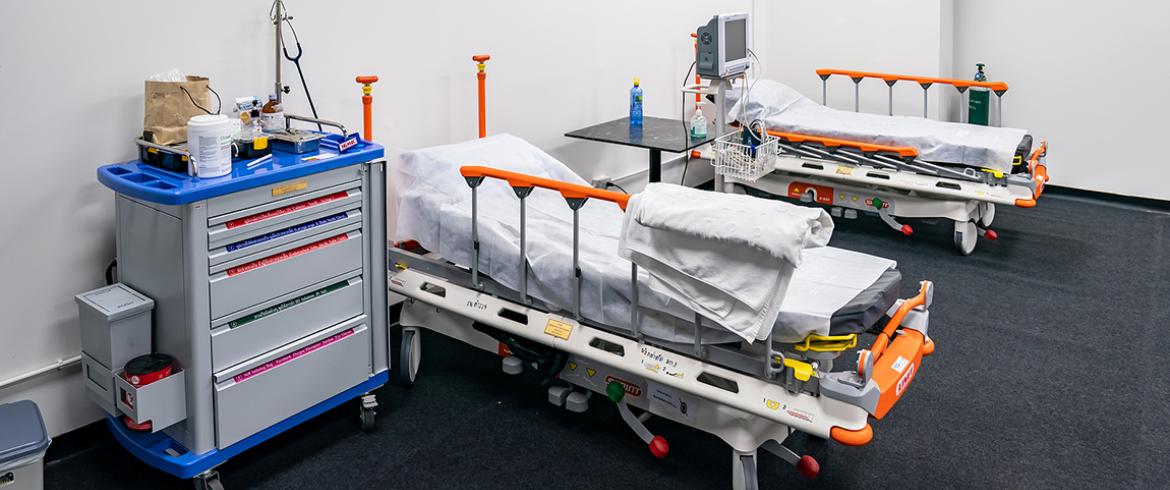 hospital beds in a makeshift hospital
