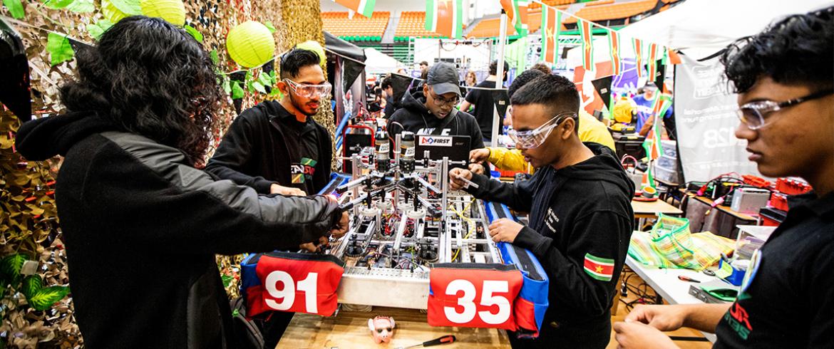 Suriname high school students on a FIRST Robotics Competition team in Tallahassee