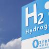 photo illustration of a hydrogen sign with zero emissions type