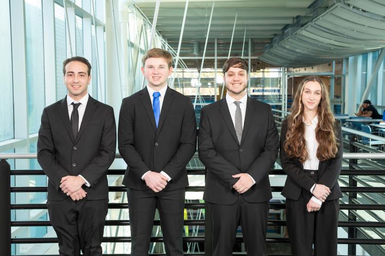 Engineering Senior Design Team 513 members standing together on FAMU-FSU College of Engineering third floor breezeway