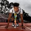 Alonzo Russell in the starting position at a track