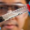 Runwei Li looks over the separation of waste solids 