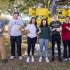 theta tau crew who refurbished the sculpture in 2022