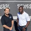 photo of two men standing in a school zone 