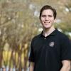 portrait of ben covitz in front of trees