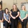 photo of famu-fsu engineering professor rebekah sweat and her team of graduate students and high school interns in the lab at HPMI