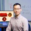 photo of famu-fsu engineering professor leo liu in front of monitor and white board